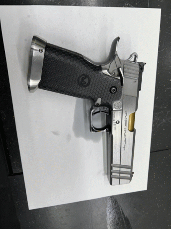 VENDO PISTOLA INFINITY PRECIO 2100€. ESTÁ IMPECABLE. SÓLO CIEN DISPARO MÁXIMO. UN CARGADOR. SÓLO ATIENDO 01