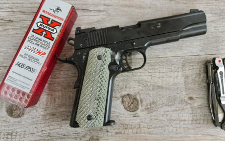 En venta Colt 1911 gold cup, calibre 22, con poquísimo uso, comprada el año pasado. Lleva alza regulable 00