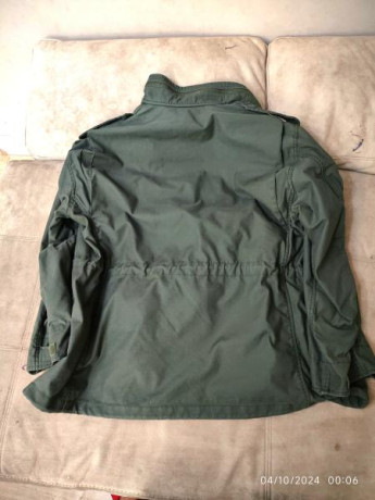 Muy poco uso, como nueva. Color verde OD. Cremalleras y botones en perfecto estado. También compré el 01