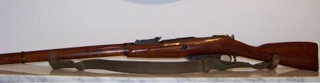 El Mosin-Nagant ..
es un rifle militar accionado por cerrojo, con cargador de cinco proyectiles, que 131