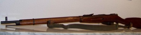 El Mosin-Nagant ..
es un rifle militar accionado por cerrojo, con cargador de cinco proyectiles, que 130