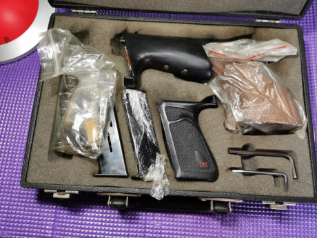 Expectacular pistola hk 9ps,con muchos repuestos, accesorios, docum original, banco de pruebas, maletin... 00