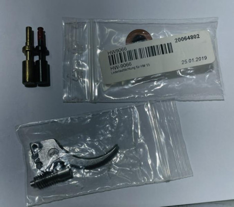 1 sello cuero de Hw 55…..5€  1 Disparador + tornillo de ajustes….. 10€ , Botones de seguro …..  10€ el 00