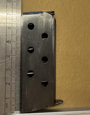 Hola, tengo este cargador del 7,65mm. Por más que busco no encuentro el arma al que puede pertenecer. 00