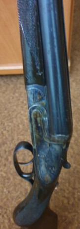 buenas, tengo un amigo que tiene desde hace años esta escopeta paralela marca COLIBRI del calibre 12...y 00