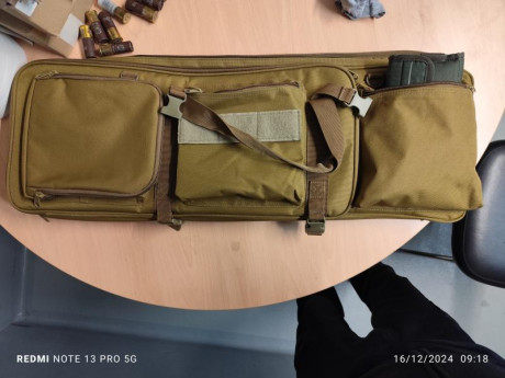 Buenos días, vendo una funda de cordura de 85x30 con tres bolsillos, bolso porta cartuchos y 2 aliviapercutores. 02