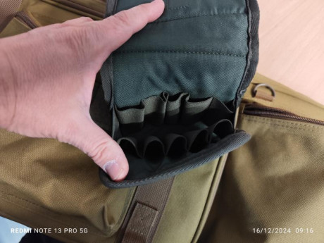 Buenos días, vendo una funda de cordura de 85x30 con tres bolsillos, bolso porta cartuchos y 2 aliviapercutores. 01