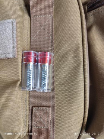 Buenos días, vendo una funda de cordura de 85x30 con tres bolsillos, bolso porta cartuchos y 2 aliviapercutores. 00