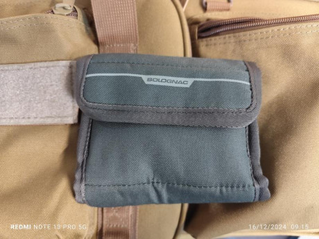 Buenos días, vendo una funda de cordura de 85x30 con tres bolsillos, bolso porta cartuchos y 2 aliviapercutores. 12