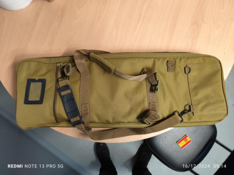 Buenos días, vendo una funda de cordura de 85x30 con tres bolsillos, bolso porta cartuchos y 2 aliviapercutores. 11