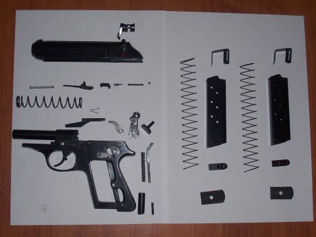 Es la palanca en forma de S que hay encima del armazón en esta foto, solo tienes que demontar corredera 00