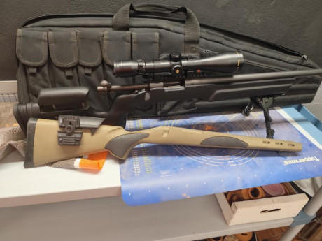 Hola vendo Rifle Remington 700 cañón pesado en CALIBRE 308w con dos culatas más visor,bípode y funda muy 01
