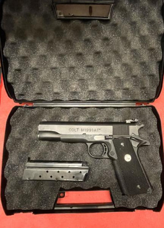 Vendo Colt 1991 A1 serie 80 En perfecto estado, pocos tiros. Cachas originales de goma mas otras de madera. 11