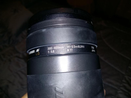está nueva. incluye onjetivo tamron 200-400. habrá tirado 20 carretes. entrego cajas originales y fundas 00