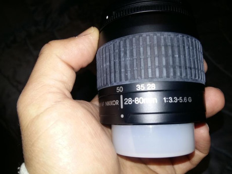 está nueva. incluye onjetivo tamron 200-400. habrá tirado 20 carretes. entrego cajas originales y fundas 12
