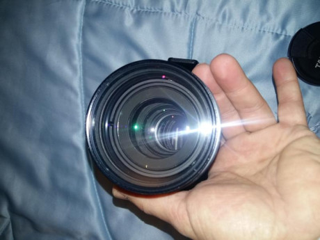 está nueva. incluye onjetivo tamron 200-400. habrá tirado 20 carretes. entrego cajas originales y fundas 11