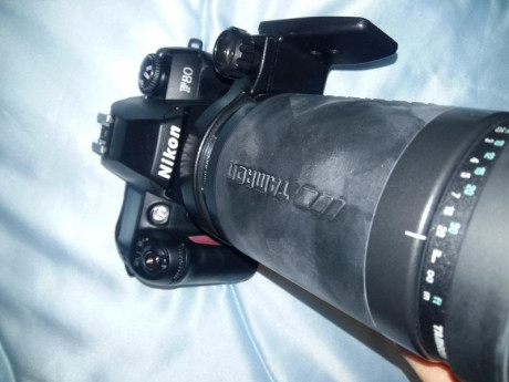 está nueva. incluye onjetivo tamron 200-400. habrá tirado 20 carretes. entrego cajas originales y fundas 10