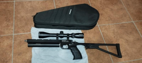 Cometa fénix 400  5.5 con funda tiene un picado en cámara de potencia y micro arañazos en el cañon habría 00