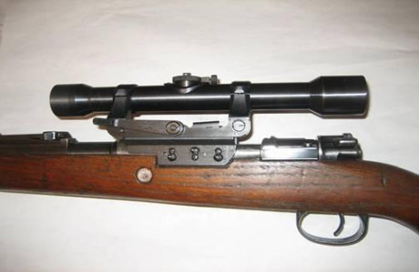Buenos días,

Estoy pensando en adquirir un Mauser 98 español, con una marca en el puente delantero de 70