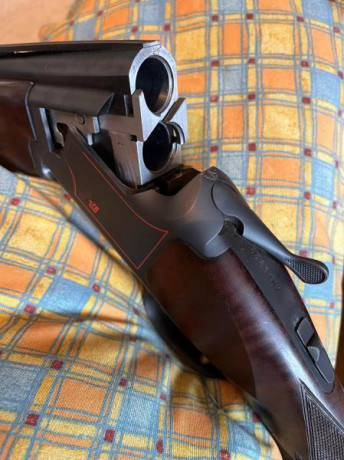 Un amigo vende esta escopeta FN para plato.  BROWNING - GTI   PLUS TR-30.           12 GA.  de 30” (76 02