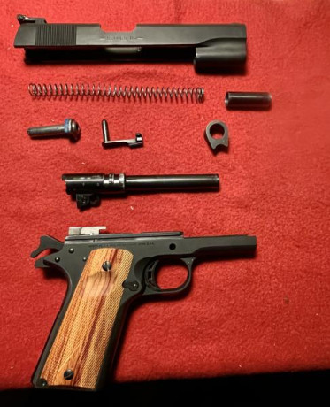 Vendo Colt 1991 A1 serie 80 En perfecto estado, pocos tiros. Cachas originales de goma mas otras de madera. 141