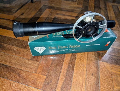 Vendo visor Niko Stirling 10-50x60mm retícula mildot utilizado en Field target en una pcp,rueda paralaje 02