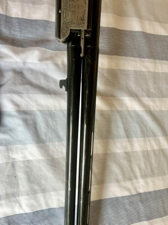 Vendo superpuesta laurona del calibre 12 con polichoques y cañones ventilados. 

La escopeta esta bien 22
