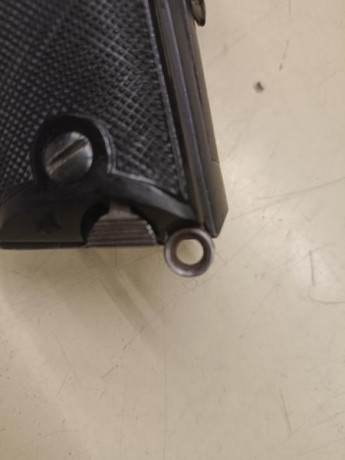 Pues eso, busco anilla para cordón fiador de Astra 600/43 y también una pieza de baquelita que llevan 00