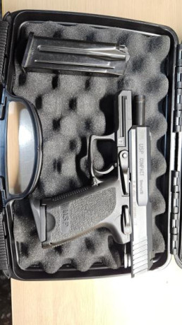 Por cambiar de capricho, vendo esta USP Compact en estado impecable, con muy pocos tiros. Con sus 2 cargadores, 12