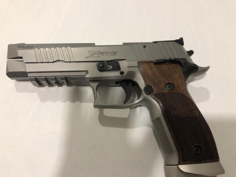 Se vende pistola 9 mm Sig Sauer X-Five .
Solo ha utilizado 1 cargador.

Fabricada en 2013 ,cañón certificado 31