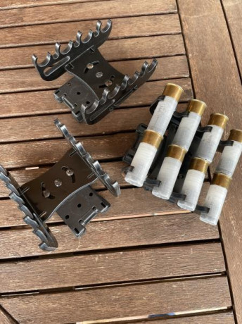 marca TACCOM SPORT 
3 de 8 cartuchos y 1 de 7 (se le rompió una patilla de plástico)
en total para 31 01
