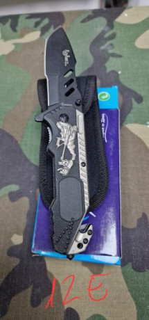 Cuchillos y navajas por cierre de tienda 51