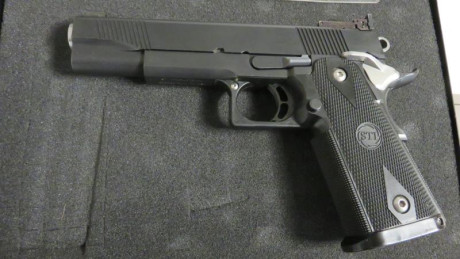 Vendo mi pistola STI 2011 customizada por HPS en Alemania dando como resultado una pistola del 9mm de 01