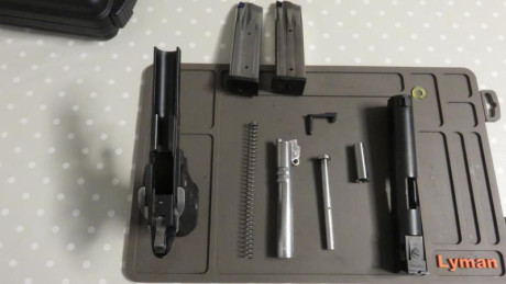 Vendo mi pistola STI 2011 customizada por HPS en Alemania dando como resultado una pistola del 9mm de 22