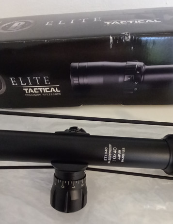Bushnell elite tactical 10x40 , reticula mildot  impecable , montado en carabina 22 y usado en un par 02