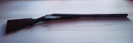 En estado de restauración, cal 12,  *** y * , con expulsores automáticos. Tiene dos pequeños golpes por 02