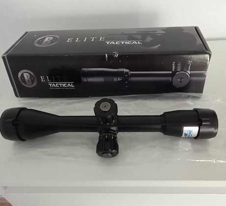 Bushnell elite tactical 10x40 , reticula mildot impecable , montado en carabina 22 y usado en un par de 00