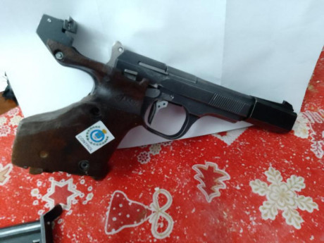 Vendo unique des 69 con cacha de zurdo el muelle recuperador son varios muelles no busque uno por que 02