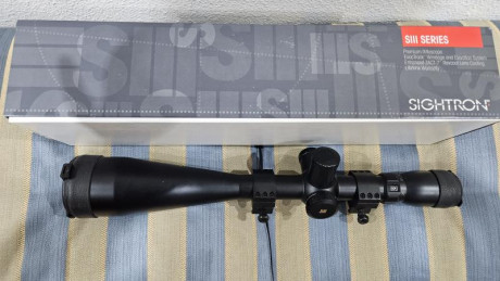 Por cese en la modalidad, vendo este visor Sightron 10-50 x 60 MIL DOT en perfecto estado. Peso 1.008.gramos. 00