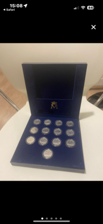 Estuche de la FNMT con 13 monedas de plata de 100 pesetas conmemorativas de la última emisión de la peseta. 02