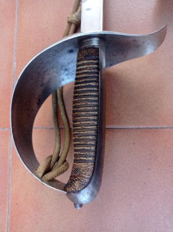 SABLE ESPAÑOL OFICIAL DE INFANTERÍA MOD. 1887 CON FIADOR.

Marcado “FABRICA DE TOLEDO 1909”. Incluído 02