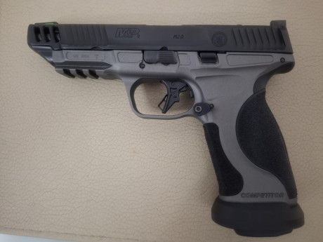 Hola pongo a la venta pistola S&W  M&P Competitor en 9 mm con cuatro cargadores solo he disparado 01