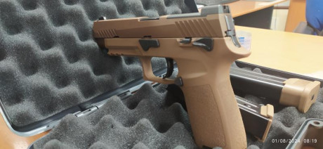 Hola a todos, 
Vendo de reestreno la Sig Sauer P320 M17 Cal. 9 mm en perfecto estado de reestreno, por 50