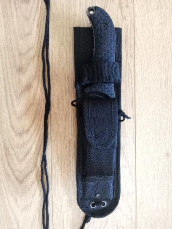 Vendo Cuchillo Schrade Frontier SCHF36, no tiene la pintura original, lleva un pavonado en frio.


 hoja 01