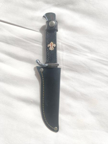 Antiguo cuchillo original de la marca MUELA con la inscripción SIEMPRE LISTO bajo la flor de lis esmaltada.

Hoja 10