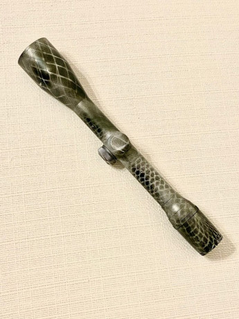 Rubber band spray paint camo on gun
 3xCzBtFdedA  11