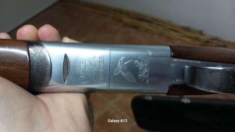 Escopeta monogatillo selector, expulsora, cañones de 71cm, es la versión Sporting, lleva 5 polichok , 00