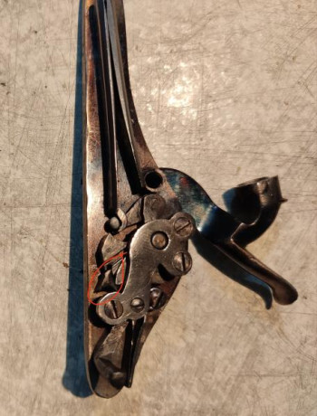 hola, alguien tiene una fotografia de la llave de la pistola galan de arsa por su parte interior , donde 70