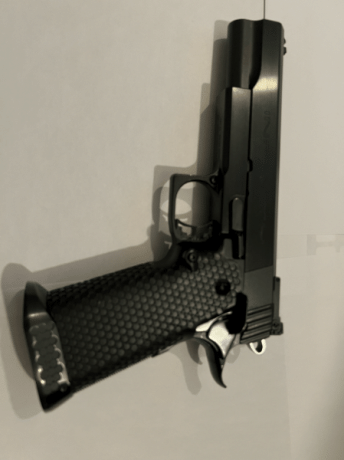 Dejo la actividad de IPSC y por ende, vendo mi pistola Infinity en inox nitrurada negra. Es un arma maravillosa. 02