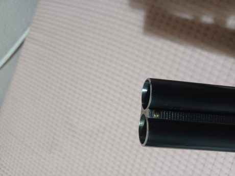 Se vende yuxtapuesta Garbi cal.12/70 estractora, cañones de 71 cm, media pletina (grabada). Muy ligera 21